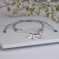 Adjustable Infinity Rope Bracelet with engraved charms