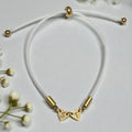 White Cord Bracelet with 2 Heart Engraved Charms