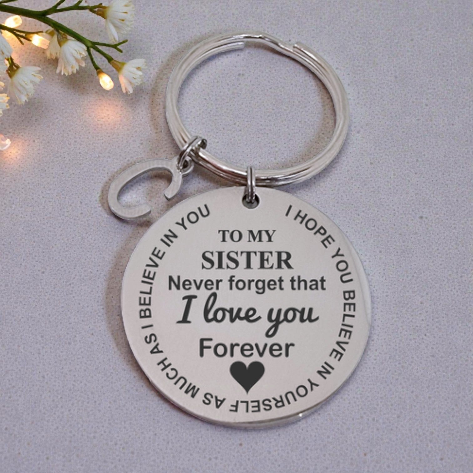 To my Sister - Round Engraved Keyring With Letter Charm